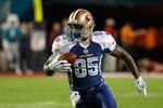 MIAMI GARDENS, FL - JANUARY 31:  Vernon Davis #85 of the NFC's San Francisco 49ers runs with the ball during the 2010 AFC-NFC Pro Bowl game at Sun Life Stadium on January 31, 2010 in Miami Gardens, Florida. The AFC defeated the NFC 41-34. (Photo by Scott Halleran/Getty Images)