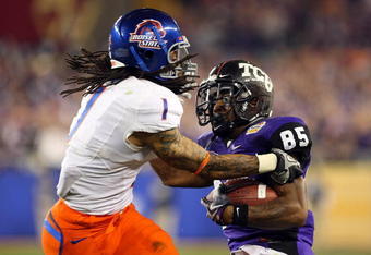GLENDALE, AZ - JANUARY 04:  Kyle Wilson #1 of the Boise State Broncos attempts to strip the ball from Jeremy Kerley #85 of the TCU Horned Frogs in the third quarter during the Tostitos Fiesta Bowl at the Universtity of Phoenix Stadium on January 4, 2010 in Glendale, Arizona.  (Photo by Christian Petersen/Getty Images)