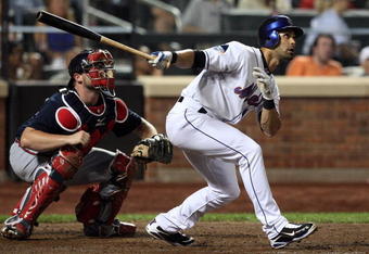 NEW YORK - AUGUST 20:  Angel Pagan #16 of the New York Mets bats against the Atlanta Braves on August 20, 2009 at Citi Field in the Flushing neighborhood of the Queens borough of New York City.  (Photo by Jim McIsaac/Getty Images)