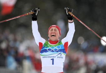 WHISTLER OLYMPIC PARK, CANADA - FEBRUARY 27: (FRANCE OUT) Justyna Kowalczyk of Poland takes 1st place during the Women's Cross Country Skiing 30km Mass Start Classic on Day 16 of the 2010 Vancouver Winter Olympic Games on February 27, 2010 in Whistler Olympic Park, Canada. (Photo by Agence Zoom/Getty Images)
