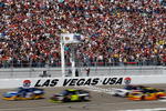 LAS VEGAS - FEBRUARY 28:  Kurt Busch, driver of the #2 Miller Lite Dodge, and Jeff Gordon, driver of the #24 DuPont/Pepsi Max Chevrolet, lead the field to start the NASCAR Sprint Cup Series Shelby American at Las Vegas Motor Speedway on February 28, 2010 in Las Vegas, Nevada.  (Photo by Geoff Burke/Getty Images for NASCAR)