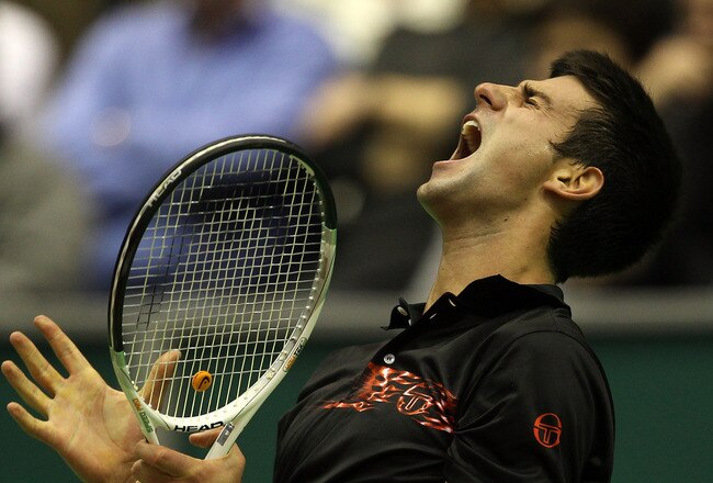 ROTTERDAM, NETHERLANDS - FEBRUARY 13:  Novak Djokovic of Serbia reacts after losing a game in his match against Mikhail Youzhny of Russia during day six of the ABN AMBRO World Tennis Tournament on February 13, 2010 in Rotterdam, Netherlands.  (Photo by Julian Finney/Getty Images)