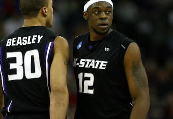OMAHA, NE - MARCH 20:  Bill Walker #13 (R) and Michael Beasley #30 of the Kansas State Wildcats stand on court against the USC Trojans during the Midwest Region first round of the 2008 NCAA Men's Basketball Tournament on March 20, 2008 at the Qwest Center in Omaha, Nebraska. Kansas State won 80-67. (Photo by Jamie Squire/Getty Images)