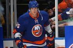 UNIONDALE, NY - JANUARY 16: Andy Sutton #25 of the New York Islanders skates out to play against the Buffalo Sabres at the Nassau Coliseum on January 16, 2010 in Uniondale, New York.  (Photo by Bruce Bennett/Getty Images)