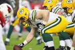 GLENDALE, AZ - JANUARY 10:  Center Scott Wells #63 of the Green Bay Packers prepares to snap the ball during the 2010 NFC wild-card playoff game against the Arizona Cardinals at the Universtity of Phoenix Stadium on January 10, 2010 in Glendale, Arizona.  The Cardinals defeated the Packers  51-45 in overtime.  (Photo by Christian Petersen/Getty Images)