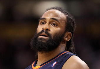 PHOENIX - JANUARY 23:  Ronny Turiaf #21 of the Golden State Warriors during the NBA game against the Phoenix Suns at US Airways Center on January 23, 2010 in Phoenix, Arizona. The Suns defeated the Warriors 112-103.  NOTE TO USER: User expressly acknowledges and agrees that, by downloading and or using this photograph, User is consenting to the terms and conditions of the Getty Images License Agreement.  (Photo by Christian Petersen/Getty Images)