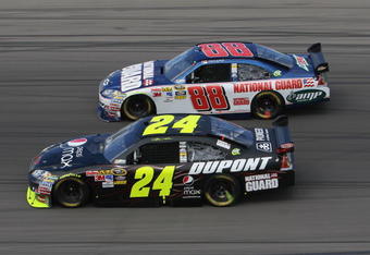 LAS VEGAS - FEBRUARY 28: Jeff Gordon, driver of the #24 DuPont/Pepsi Max Chevrolet, and Dale Earnhardt Jr., driver of the #88 National Guard/AMP Energy Chevrolet, race side by side during the NASCAR Sprint Cup Series Shelby American at Las Vegas Motor Speedway on February 28, 2010 in Las Vegas, Nevada.  (Photo by Stephen Dunn/Getty Images for NASCAR)