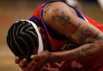 CHICAGO - FEBRUARY 20: Allen Iverson #3 of the Philadelphia 76ers holds his head after being hit in the face during a game against the Chicago Bulls at the United Center on February 20, 2010 in Chicago, Illinois. NOTE TO USER: User expressly acknowledges and agrees that, by downloading and/or using this Photograph, User is consenting to the terms and conditions of the Getty Images License Agreement. (Photo by Jonathan Daniel/Getty Images)