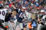 FOXBORO, MA - JANUARY 10:  Quarterback Tom Brady #12 of the New England Patriots throws a pass against the Baltimore Ravens during the 2010 AFC wild-card playoff game at Gillette Stadium on January 10, 2010 in Foxboro, Massachusetts.  (Photo by Jim Rogash/Getty Images)