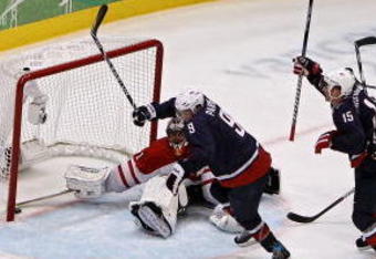 VANCOUVER, BC - FEBRUARY 28:  Zach Parise #9 of the United States celebrates after scoring a goal to tie the scores 2-2 late in the third during the ice hockey men's gold medal game between USA and Canada on day 17 of the Vancouver 2010 Winter Olympics at Canada Hockey Place on February 28, 2010 in Vancouver, Canada.  (Photo by Alex Livesey/Getty Images)