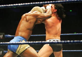 SYDNEY, AUSTRALIA - JUNE 15:  (L-R) Shelton Benjamin locks up with CM Punk during WWE Smackdown at Acer Arena on June 15, 2008 in Sydney, Australia.  (Photo by Gaye Gerard/Getty Images)