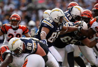 SAN DIEGO - DECEMBER 20:  Tight end Brandon Manumaleuna #86 of the San Diego Chargers blocks against the Cincinnati Bengals on December 20, 2009 at Qualcomm Stadium in San Diego, California.  (Photo by Stephen Dunn/Getty Images)