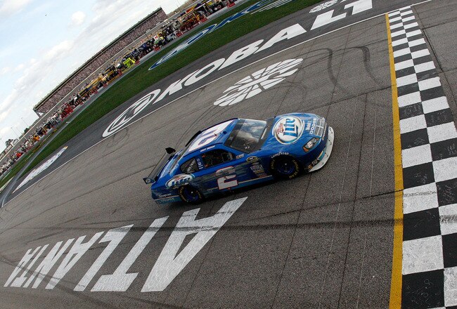 ATLANTA - MARCH 08:  Kurt Busch, driver of the #2 Miller Lite Dodge crosses the finish line to win the NASCAR Sprint Cup Series Kobalt Tools 500 at the Atlanta Motor Speedway on March 8, 2009 in Hampton, Georgia.  (Photo by Chris Graythen/Getty Images)