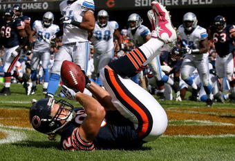 CHICAGO - OCTOBER 04: Greg Olsen #82 of the Chicago Bears catches a touchdown pass against the Detroit Lions on October 4, 2009 at Soldier Field in Chicago, Illinois. The Bears defeated the Lions 48-24. (Photo by Jonathan Daniel/Getty Images)