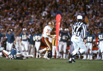 PASADENA, CA - JANUARY 30:  Running back John Riggins #44 of the Washington Redskins rushes for yards during Super Bowl XVII against the Miami Dolphins at the Rose Bowl on January 30, 1983 in Pasadena, California.  John Riggins was named Super Bowl MVP as the Redskins won 27-17.  (Photo by Getty Images)