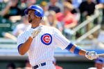 MESA, AZ - MARCH 04:  Derrek Lee #25 of the Chicago Cubs hits a solo home run against the Oakland Athletics during the first inning of the MLB spring training game at HoHoKam Park on March 4, 2009 in Mesa, Arizona  (Photo by Christian Petersen/Getty Images)