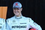 VALENCIA, SPAIN - FEBRUARY 01:  Michael Schumacher (R) of Germany and Mercedes GP and Nico Rosberg (L) of Germany and Mercedes GP attend the roll out of the new Mercedes W01 at the Ricardo Tormo Circuit on February 1, 2010 in Valencia, Spain.  (Photo by Mark Thompson/Getty Images)