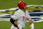 LOS ANGELES, CA - OCTOBER 13:  Matt Stairs #12 of the Philadelphia Phillies hits a two-run pinch hit home run in the eighth inning off Jonathan Broxton #51 of the Los Angeles Dodgers to take a two-run lead in game Game Four of the National League Championship Series during the 2008 MLB playoffs on October 13, 2008 at Dodger Stadium in Los Angeles, California.  (Photo by Jeff Gross/Getty Images)