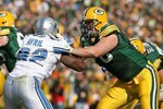GREEN BAY, WI - OCTOBER 18: Chad Clifton #76 of the Green Bay Packers blocks Cliff Avril #92 of the Detroit Lions at Lambeau Field on October 18, 2009 in Green Bay, Wisconsin. The Packers defeated the Lions 26-0. (Photo by Jonathan Daniel/Getty Images)