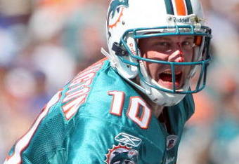 SAN DIEGO, CA - SEPTEMBER 27: Quarterback Chad Pennington #10 of the Miami Dolphins bleeding at the line of scrimmage against the San Diego Chargers during NFL Game at Qualcomm Stadium on September 27, 2009 in San Diego, California. He left the game with a shoulder injury. (Photo by Donald Miralle/Getty Images)