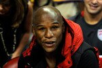LAS VEGAS - OCTOBER 15:  Boxer Floyd Mayweather Jr. watches the preseason game between the Los Angeles Lakers and the Sacramento Kings at the Thomas & Mack Center October 15, 2009 in Las Vegas, Nevada. NOTE TO USER: User expressly acknowledges and agrees that, by downloading and/or using this Photograph, user is consenting to the terms and conditions of the Getty Images License Agreement.  (Photo by Ethan Miller/Getty Images)