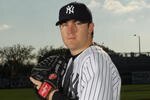 TAMPA, FL - FEBRUARY 25:  Phil Hughes #65 of the New York Yankees poses for a photo during Spring Training Media Photo Day at George M. Steinbrenner Field on February 25, 2010 in Tampa, Florida.  (Photo by Nick Laham/Getty Images)