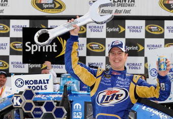 ATLANTA - MARCH 07:  Kurt Busch, driver of the #2 Miller Lite Dodge, poses in Victory Lane after winning the NASCAR Sprint Cup Series Kobalt Tools 500 at Atlanta Motor Speedway on March 7, 2010 in Hampton, Georgia.  (Photo by John Harrelson/Getty Images)