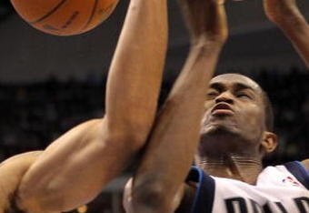 DALLAS - FEBRUARY 24:  Shannon Brown #12 of the Los Angeles Lakers reaches for the ball against Rodrigue Beaubois #3 of Dallas Mavericks on February 24, 2010 at American Airlines Center in Dallas, Texas.  NOTE TO USER: User expressly acknowledges and agrees that, by downloading and/or using this Photograph, user is consenting to the terms and conditions of the Getty Images License Agreement.  (Photo by Ronald Martinez/Getty Images)