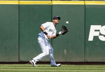 SEATTLE  - MAY 24: Franklin Gutierrez #21 of the Seattle Mariners moves to catch the flyball during the game against the San Francisco Giants on May 24, 2009 at Safeco Field in Seattle, Washington. (Photo by Otto Greule Jr/Getty Images)  