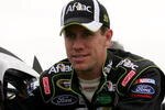 DAYTONA BEACH, FL - FEBRUARY 05:  Carl Edwards, driver of the #99 Aflac Ford, pushes his car during practice for the NASCAR Sprint Cup Series Daytona 500 at Daytona International Speedway on February 5, 2010 in Daytona Beach, Florida.  (Photo by Jerry Markland/Getty Images for NASCAR)