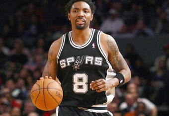 NEW YORK - FEBRUARY 17:  Roger Mason #8 of the San Antonio Spurs dribbles the ball downcourt against the New York Knicks at Madison Square Garden on February 17, 2009 in New York City. NOTE TO USER: User expressly acknowledges and agrees that, by downloading and/or using this Photograph, User is consenting to the terms and conditions of the Getty Images License Agreement.  (Photo by Chris McGrath/Getty Images)