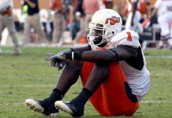 AUSTIN, TX - OCTOBER 25:  Wide receiver Dez Bryant #1 of the Oklahoma State Cowboys reacts after 24-28 loss against the Texas Longhorns at Texas Memorial Stadium on October 25, 2008 in Austin, Texas.  (Photo by Ronald Martinez/Getty Images)
