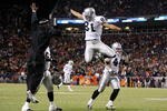 DENVER - DECEMBER 20:  Chaz Schilens #81 of the Oakland Raiders is congratulated by Javon Walker (L) after scoring a touchdown late in the fourth quarter against the Denver Broncos at Invesco Field at Mile High on December 20, 2009 in Denver, Colorado. The Raiders defeated the Broncos 20-19.  (Photo by Jeff Gross/Getty Images)