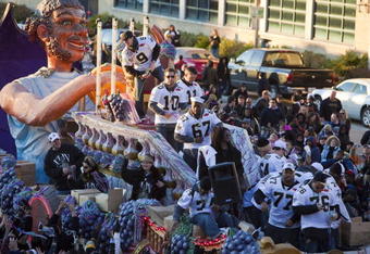 NEW ORLEANS - FEBRUARY 09: New Orleans Saints Quarterback Drew Brees #9 and teammates celebrate during the New Orleans Saints Super Bowl XLIV Victory Parade as they ride past the Louisiana Superdome on February 9, 2010 in New Orleans, Louisiana. (Photo by Skip Bolen/Getty Images)