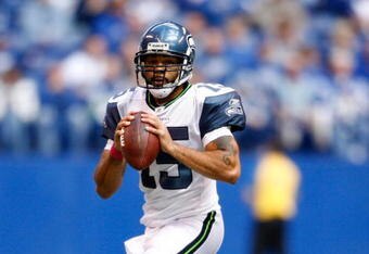 INDIANAPOLIS - OCTOBER 04:  Seneca Wallace #15 of the the Seattle Seahawks throws a pass during the NFL game against the Indianapolis Colts at Lucas Oil Stadium on October 4, 2009 in Indianapolis, Indiana.  (Photo by Andy Lyons/Getty Images)