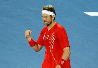 SYDNEY, AUSTRALIA - JANUARY 14:  Mardy Fish of USA celebrates winning his quarter final match against Peter Luczak of Australia during day five of the 2010 Medibank International at Sydney Olympic Park Sports Centre on January 14, 2010 in Sydney, Australia.  (Photo by Mark Nolan/Getty Images)