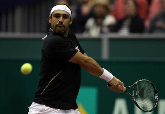 ROTTERDAM, NETHERLANDS - FEBRUARY 11:  Marcus Baghdatis of Cyprus in action in his match against Nikolay Davydenko of Russia during day four of the ABN AMBRO World Tennis Tournament on February 11, 2010 in Rotterdam, Netherlands.  (Photo by Julian Finney/Getty Images)