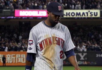 NEW YORK - OCTOBER 09:  Denard Span #2 of the Minnesota Twins walks off the field after losing against the New York Yankees in Game Two of the ALDS during the 2009 MLB Playoffs at Yankee Stadium on October 9, 2009 in the Bronx borough of New York City.  (Photo by Jim McIsaac/Getty Images)