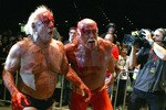 PERTH, AUSTRALIA - NOVEMBER 24:  Hulk Hogan guides Rick Flair back to the ring during the Hulkamania Tour at the Burswood Dome on November 24, 2009 in Perth, Australia.  (Photo by Paul Kane/Getty Images)
