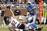 DETROIT - JANUARY 03: Greg Olsen #82 of the Chicago Bears celebrates a second quarter touchdown in front of Marvin White #25 of the Detroit Lions on January 3, 2010 at Ford Field in Detroit, Michigan.  (Photo by Gregory Shamus/Getty Images)