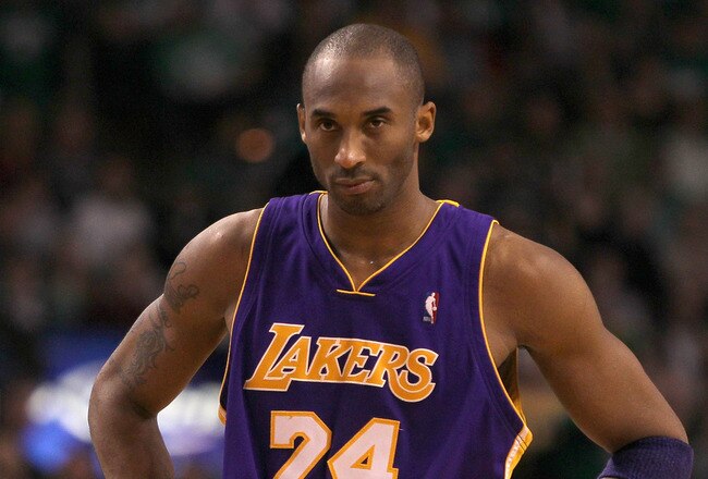 BOSTON - JANUARY 31:  Kobe Bryant  #24 the Los Angeles Lakers stands on the court during the closing minutes of a game  against the Boston Celtics at the TD Garden on January 31, 2010 in Boston, Massachusetts.  The Lakers won 90-89. NOTE TO USER: User expressly acknowledges and agrees that, by downloading and or using this photograph, User is consenting to the terms and conditions of the Getty Images License Agreement. (Photo by Jim Rogash /Getty Images)