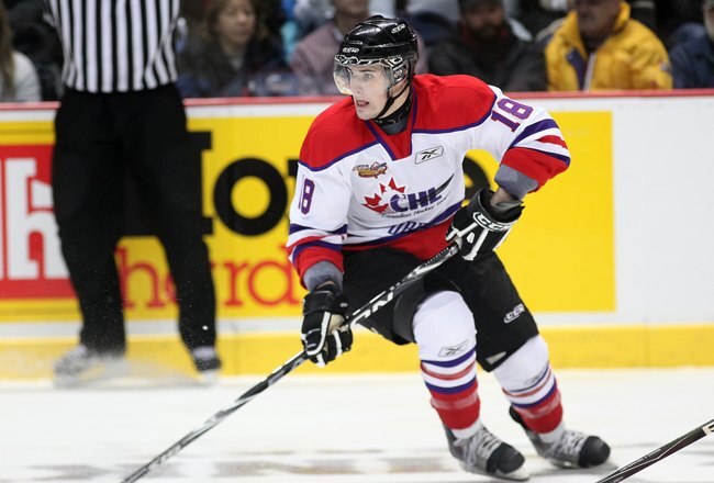 WINDSOR, ON - JANUARY 20:  John McFarland #18 of Team Orr skates with the puck during the Home Hardware CHL/NHL Top Prospects game against Team Cherry on January 20, 2010 at the WFCU Centre in Windsor, Ontario. Team Cherry defeated Team Orr 4-2. (Photo by Claus Andersen/Getty Images)