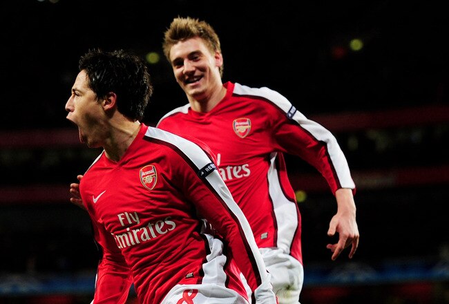 LONDON, ENGLAND - MARCH 09:  Samir Nasri (L) of Arsenal celebrates with teammate Nicklas Bendtner after scoring his team's third goal during the UEFA Champions League round of 16 match between Arsenal and FC Porto at the Emirates Stadium on March 9, 2010 in London, England.  (Photo by Mike Hewitt/Getty Images)