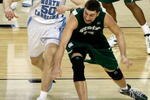DETROIT - APRIL 06:  Tyler Hansbrough #50 of the North Carolina Tar Heels and Goran Suton #14 of the Michigan State Spartans go after the ball during the 2009 NCAA Division I Men's Basketball National Championship game at Ford Field on April 6, 2009 in Detroit, Michigan.  (Photo by Gregory Shamus/Getty Images)