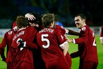 KAZAN, RUSSIA - APRIL 19:  Cristian Ansaldi (L), Pyotr Bystrov (C) and Lasha Salukvadze (R) of FC Rubin Kazan celebrate after scoring a goal during the Russian Premier League match between FC Rubin and FC Dinamo at the Centralni Stadium on April 19, 2009 in Kazan, Russia.   (Photo by Roman Hasaev/Epsilon/Getty Images)