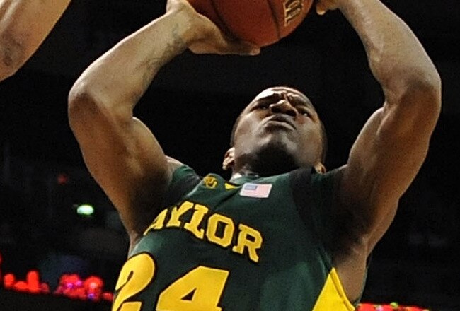 OKLAHOMA CITY - MARCH 11: Guard LaceDarius Dunn #24 of the Baylor Bears takes a shot against Toney McCray #30 of the Nebraska Cornhuskers during the Phillips 66 Big 12 Men's Basketball Championship at the Ford Center March 11, 2009 in Oklahoma City, Oklahoma.  (Photo by Ronald Martinez/Getty Images)