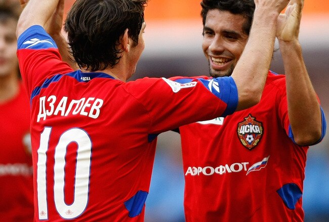 MOSCOW,  RUSSIA - SEPTEMBER 12:  Alan Dzagoev (L)  and Gusmao Guilherme (R) of FC CSKA Moscow celebrate after scoring a goal during the Russian Football League Championship match between  FC CSKA Moscow and FC Krylia Sovetov Samara at the Luzhniki Stadium on September 12, 2009 in Moscow, Russia. (Photo by Alexandr Wilf/Epsilon/Getty Images)