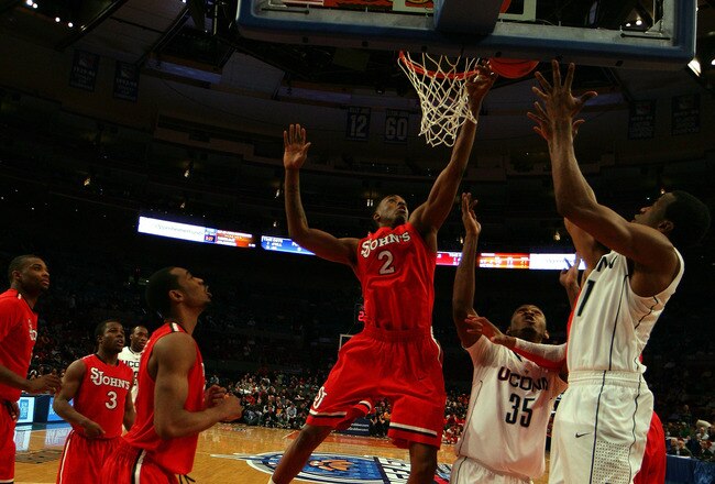 NEW YORK - MARCH 09:  Anthony Mason Jr. of the St. John's Red Storm shoots over the Connecticut Huskies at Madison Square Garden on March 9, 2010 in New York, New York. The Red Storm defeated the Huskies 73-51.  (Photo by Chris Trotman/Getty Images)