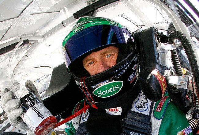 ATLANTA - MARCH 05:  Carl Edwards, driver of the #99 Scotts Ford, sits in his car during practice for the NASCAR Sprint Cup Series Kobalt Tools 500 at Atlanta Motor Speedway on March 5, 2010 in Hampton, Georgia.  (Photo by Jason Smith/Getty Images for NASCAR)