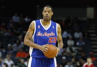 CHARLOTTE, NC - FEBRUARY 9:  Marcus Camby #23 of the Los Angeles Clippers holds the ball against the Charlotte Bobcats during the game at Time Warner Cable Arena on February 9, 2009 in Charlotte, North Carolina. NOTE TO USER: User expressly acknowledges and agrees that, by downloading and or using this photograph, User is consenting to the terms and conditions of the Getty Images License Agreement. (Photo by Streeter Lecka/Getty Images) 